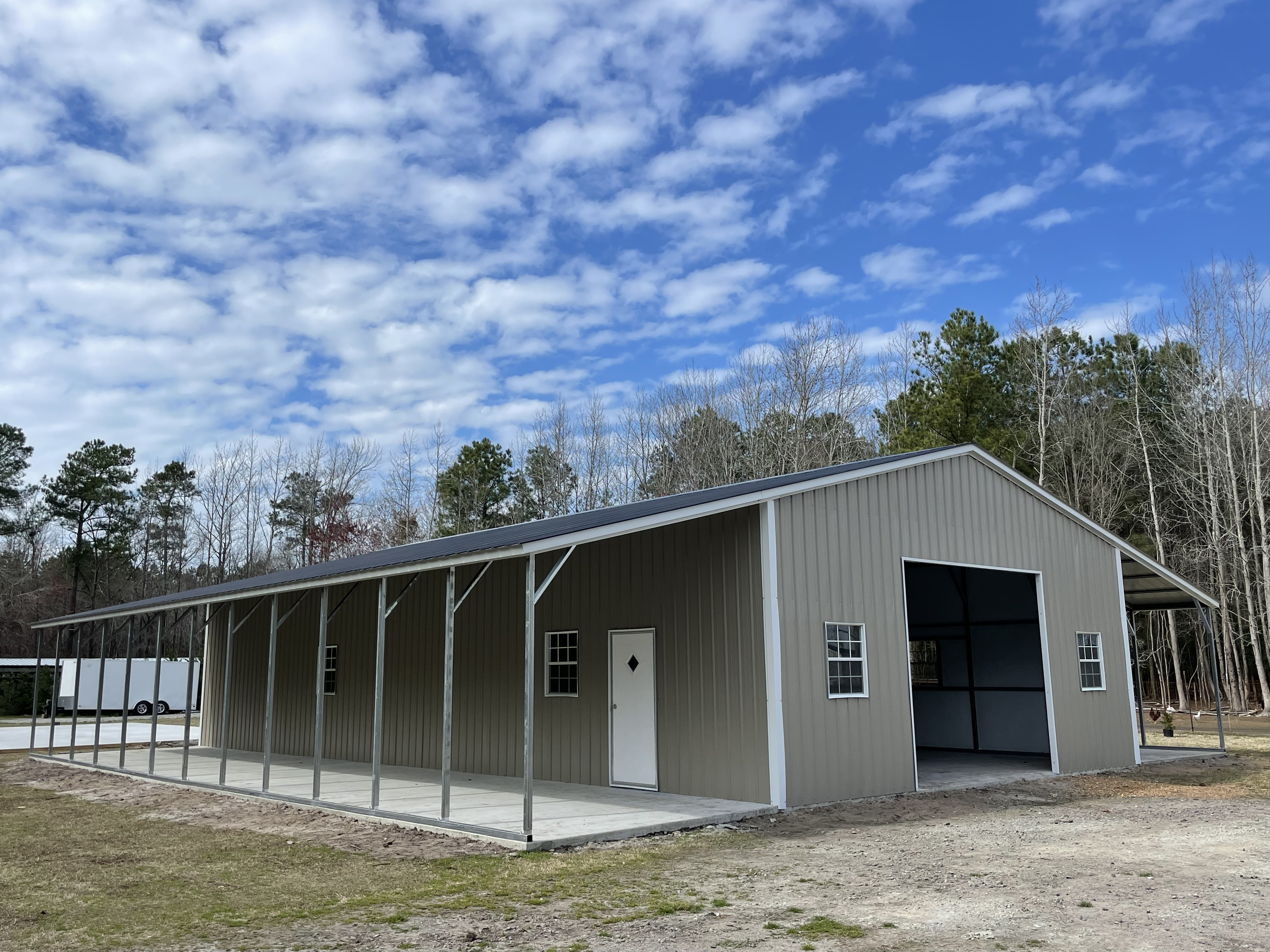 48×21 Seneca Barn Boxed Eave Style with Two Enclosed Lean Too’s.